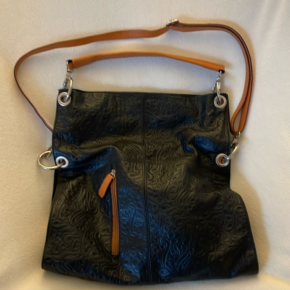 Black and tan leather purse like new